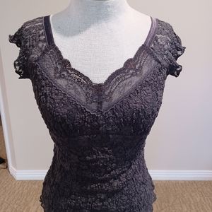 Cabi stretch lace cami, V-neck, cap sleeve.   Grey w/Grey stretch lining.
